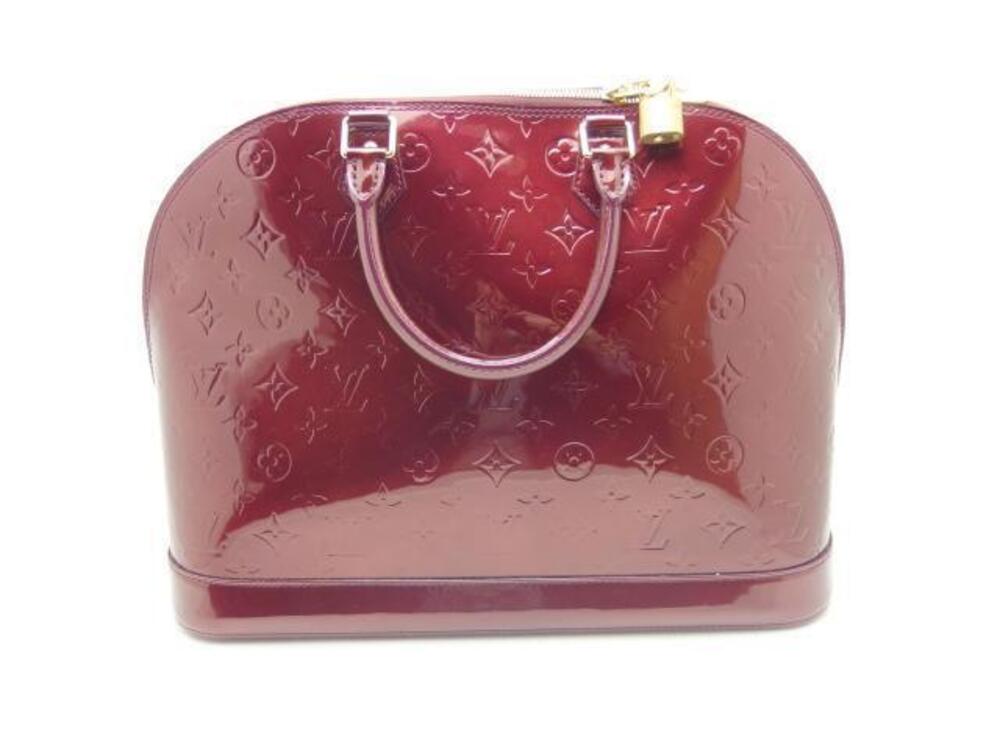 LOUIS VUITTON Alma handbag Vernis Pomme d Amour